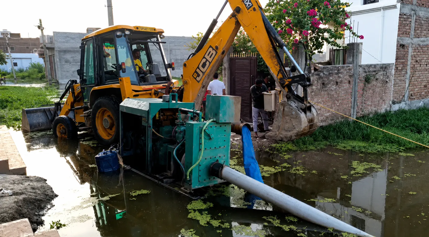 High-capacity dewatering pump operating on an Indian urban road